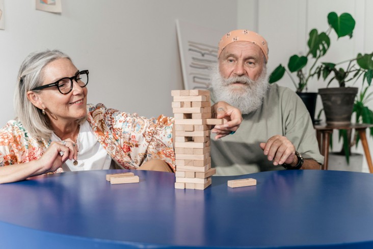Older couple playing jenga